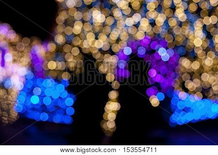 Blurred Silhouettes Of People On The Background Of Christmas Decorations 9