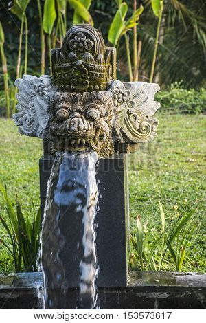sculpture of a deamon in the Jungle of Ubud in Bali Indonesia Mandapa