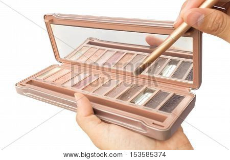 Women hand hold makeup brush and makeup cheeks for beauty concept