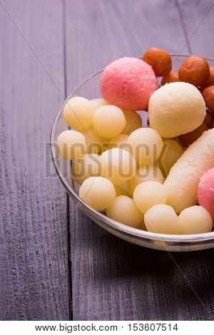 Bangladesh or kolkata's or India's favourite sweet rasgulla, chamcham and gulab jamun, dry rasgulla, bengal sweets, made of milk / khoya, sweet meets, extreme closeup