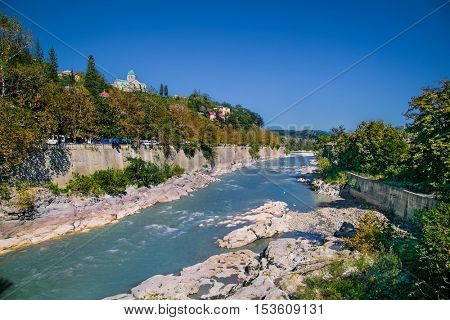 View of Bagrati Cathedral (Cathedral of Dormition) on the bank of Rioni river in Kutaisi, Caucasus region, Georgia , Europe.
