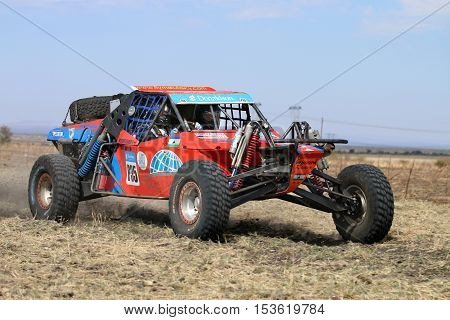 Forty Five Degree Close-up View Of Speeding Red Aceco Rally Car