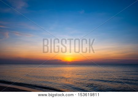 Beautiful sunrise over the horizon in the sea - Dark tone color. Hua Hin Thailand
