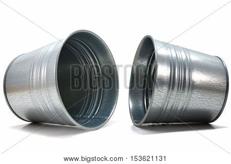 Steel cans falling with white background, stationary