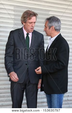 LOS ANGELES - OCT 25:  Hugh Laurie, David Shore at the Hugh LaurieHollywood Walk of Fame Star Ceremony at the Hollywood Blvd. on October 25, 2016 in Los Angeles, CA