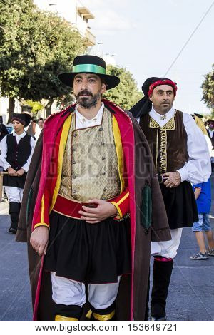 QUARTU S.E. ITALY - September 17 2016: Parade of Sardinian costumes and floats for the grape festival in honor of the celebration of St. Helena. - Sardinia