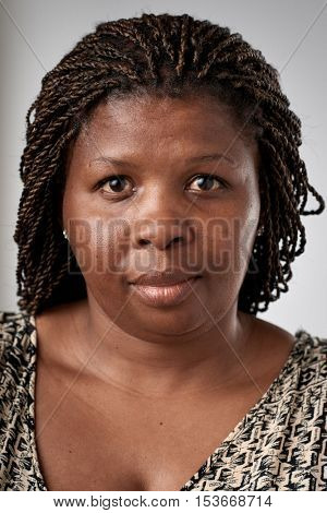 Portrait of real black african woman with no expression ID or passport photo full collection of diverse face and expressions