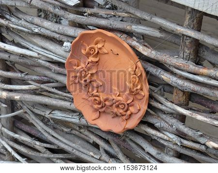 The work of a potter even on the fence