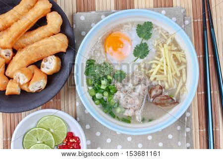 Rice porridge with mined pork and chicken lever with Patongko (deep-fried dough stick)