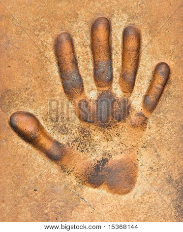 Hand Druck auf den Boden. Cannes Frankreich.
