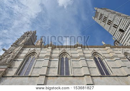 Walls and tower of the Siena Cathedral region of Tuscany Italy. Siena Dome