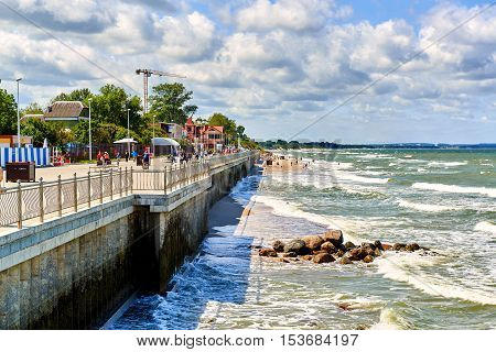 Zelenograd Russia - July 16 2016: View to the Baltic Sea and seafront promenade of Zelenograd. Curonian spit Kaliningrad region. Russia