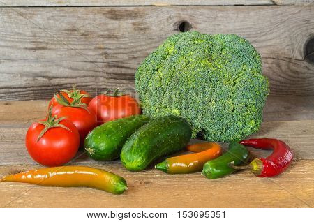 still life with vegetables: tomatoes cucumbers Chile Brussels sprouts