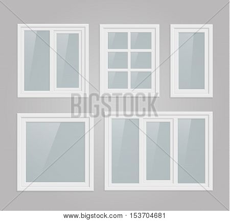 Set of transparent metal plastic windows on gray wall