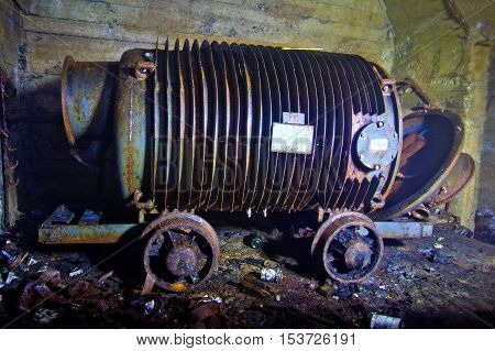 Rusty old cart in abandoned coal mine, Abkhazia