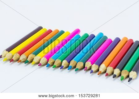 Colour pencils isolated on white background close up