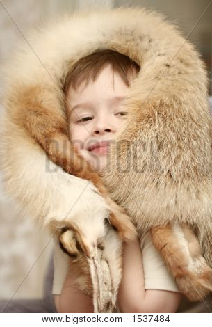 The Child Has Muffled In Fur Of The Fox 