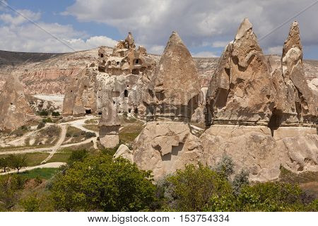 Volcanic rock formations in valley in Turkey