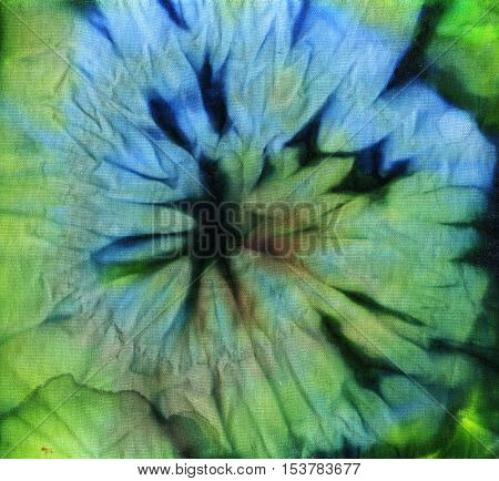 Tie dye pattern abstract background. Blue and pale green