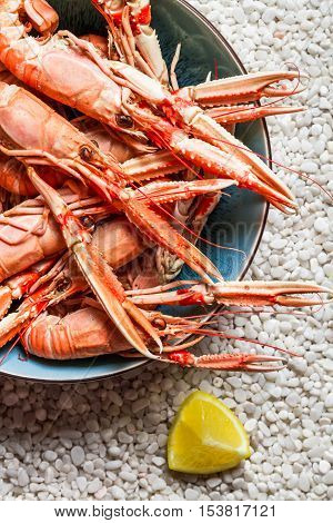 Scampi Served With Lemon On The Beach