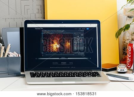 PARIS FRANCE - OCT 28 2016: Apple Computers website on new MacBook Pro Retina with OLED touch bar in a geek creative room showcasing new professional laptop - detail of 3d graphics software on the new laptop