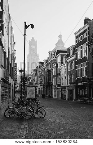 Utrecht Netherlands - October 23 2016: The shopping street Zadelstraat in the old town of Utrecht and in the background the Dom Tower.