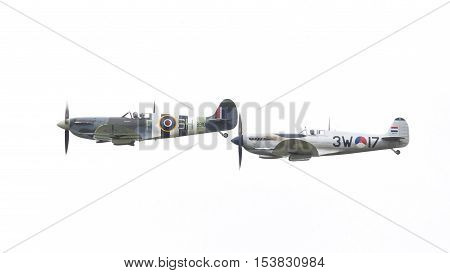 Leeuwarden, The Netherlands - June 11, 2016: Vintage Spitfire Fighter Planes Making A Low Flypast Fo