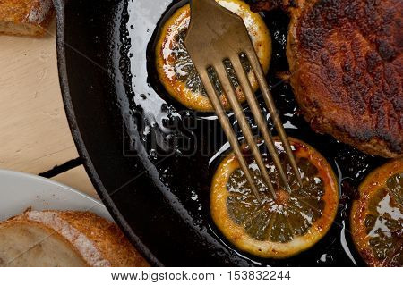 Pork Chop Seared On Iron Skillet