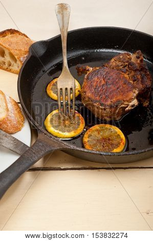 Pork Chop Seared On Iron Skillet