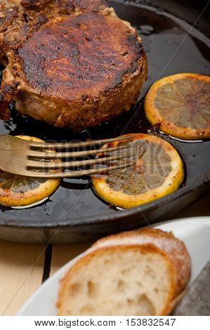 Pork Chop Seared On Iron Skillet