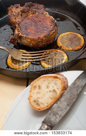 Pork Chop Seared On Iron Skillet