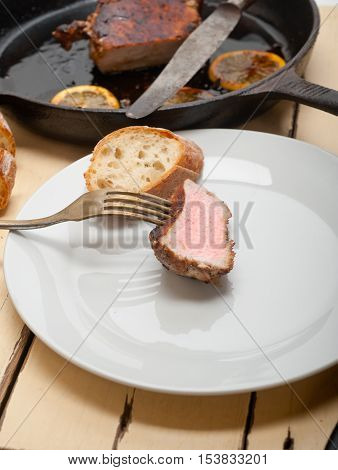 Pork Chop Seared On Iron Skillet