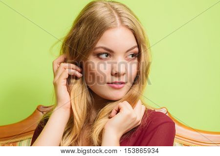 Attractive pretty young woman. Charming glamorous blonde girl.