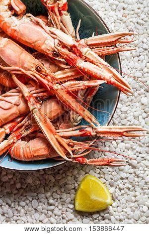 Scampi Served With Lemon On The Beach