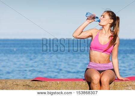 Woman Drinking Water After Sport Gym Outdoor
