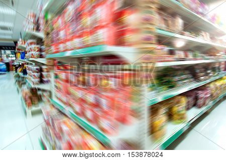 Supermarket shelves and goods in the store.