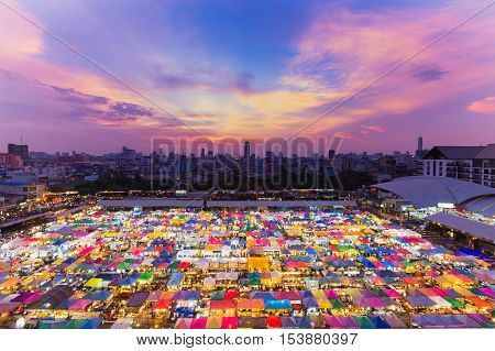 Aerial view Bangkok city night market with beauty after sunset sky background