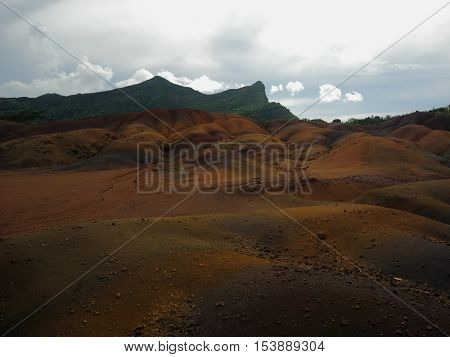 Seven Coloured Earth in dramatic weather. Chamarel, Mauritius. Landscape photograph.