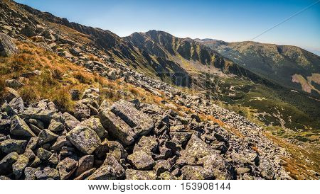 Mountain Landscape on Sunny Day with Rocks in Foreground. Mount Derese Low Tatras Mountain Slovakia.