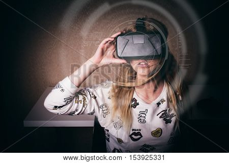 blonde girl playing and enjoy in virtual reality