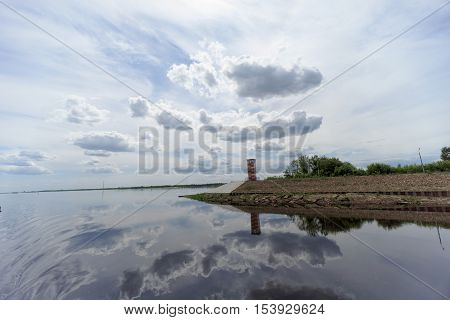 Gorodets,, Russia. - June 2.2016. Mayak Gorodetsky Gateway On The Volga River. Reflection Of Clouds