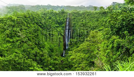Vibrant tall Papapapaitai falls on Upolu island, Samoa