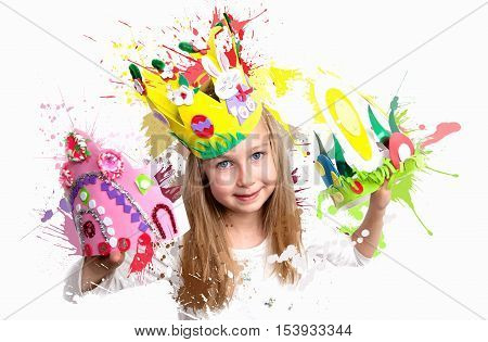 Little girl demonstrating her craft work, Easter bonnets and crown.