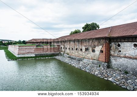 Old castle with moat in Holic Slovak republic. Cultural heritage. Architectural theme. Historical object.