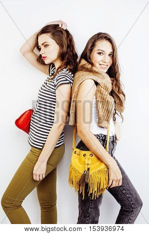 two best friends teenage girls together having fun, posing emotional on white background, besties happy smiling, lifestyle people concept close up