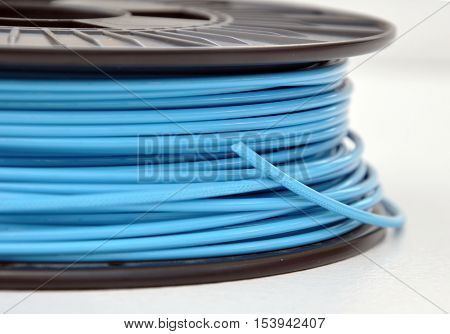 Blue coloured 3d printing filament plastic spool