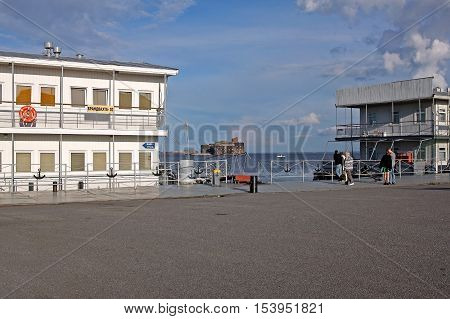 Kronstadt Russia - July 10 2016: view of the Fort Alexander (plague Fort) and a pier near Fort Constantine. The FORTS of Saint-Petersburg is a complex of permanent fortifications at different times built to protect the capital from attack from the sea.
