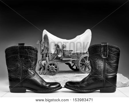 Kids cowboy black boots and chuck wagon with room for your type in black and white.