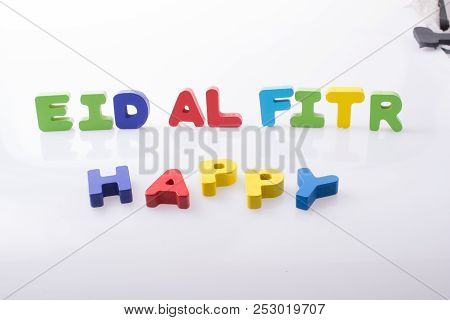 The Word Eid El Fitr  Written With Colorful Letter Blocks