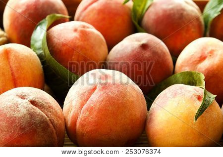 Healthy Eating Concept. Wooden Tray Fully Stacked With Local Produce Farm Grown Organic Ripe Peaches